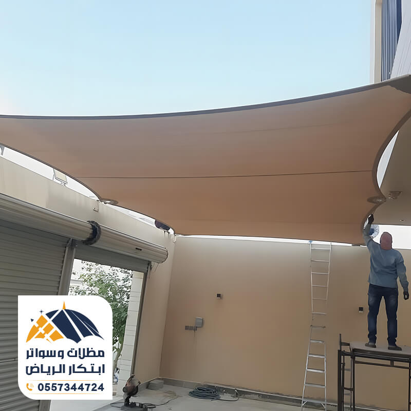 مظلة سيارة بالشد الانشائي